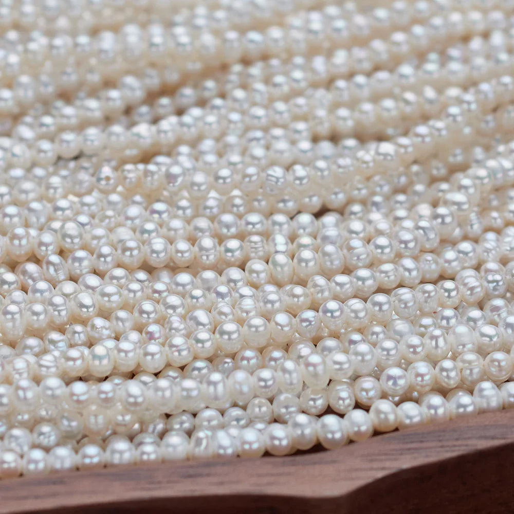 High quality 2-3mm small size rice seed natural freshwater white pearl chain loose bead string wholesale high loose beads