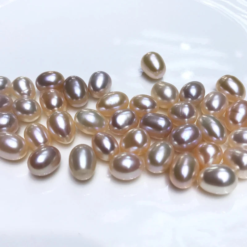 Hot Selling 100% Natural White Freshwater Pearls Low Price Rice Beads 2A Quality 5-11mm Length 6-14mm for Making Jewelry