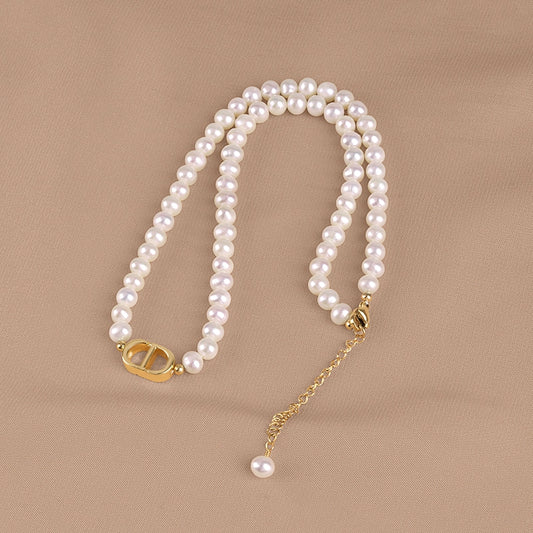 Natural freshwater pearl necklace strong light niche round bead pig nose pendant collarbone chain female XL089