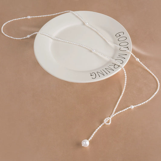 Natural freshwater pearl necklace, rice-shaped bead sweater chain, long temperament ins women's niche light luxury XL022