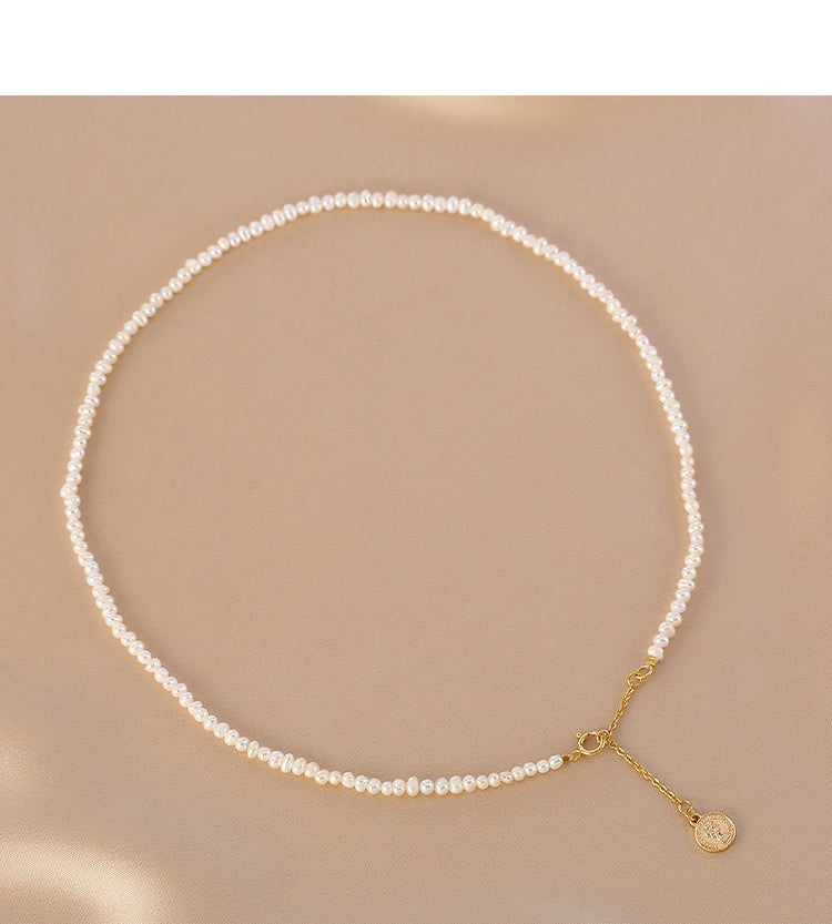 Natural pearl necklace, simple and exquisite irregular millet beads, tag necklace.