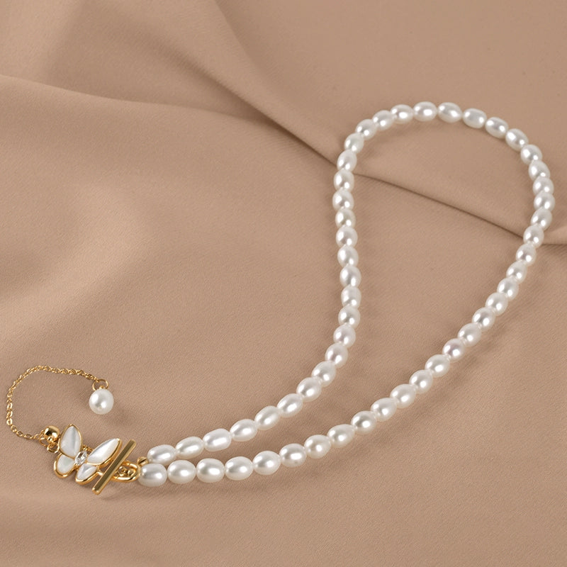 Natural freshwater pearl necklace bow buckle rice beads ins fringed temperament collarbone chain XL062