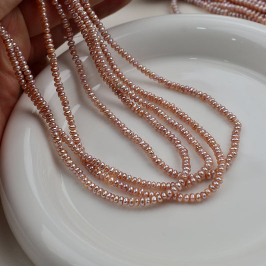 1234 natural freshwater pearls about 3mm purple pearls