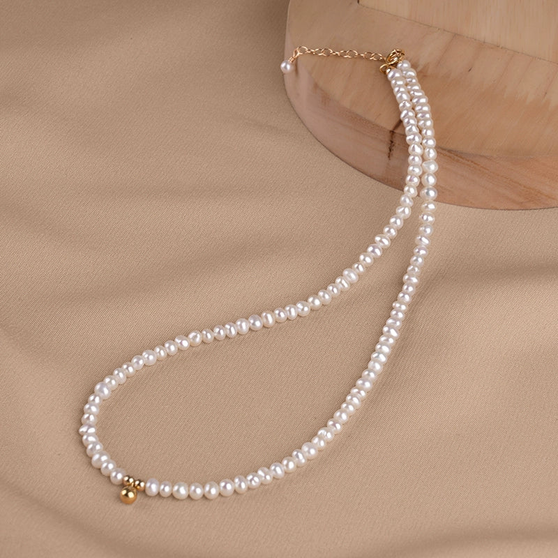 Natural freshwater pearl necklace niche bag gold nearly round strong light baby bead collarbone chain XL065