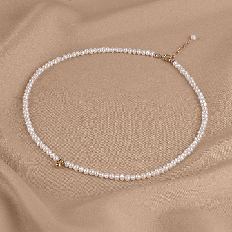 Natural freshwater pearl necklace niche bag gold nearly round strong light baby bead collarbone chain XL065