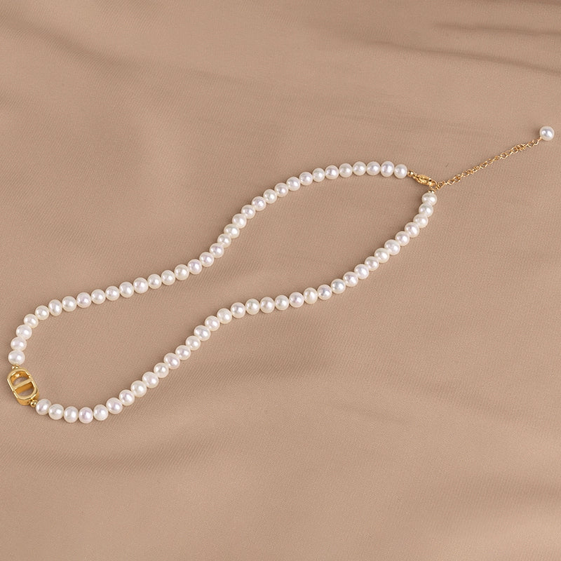 Natural freshwater pearl necklace strong light niche round bead pig nose pendant collarbone chain female XL089