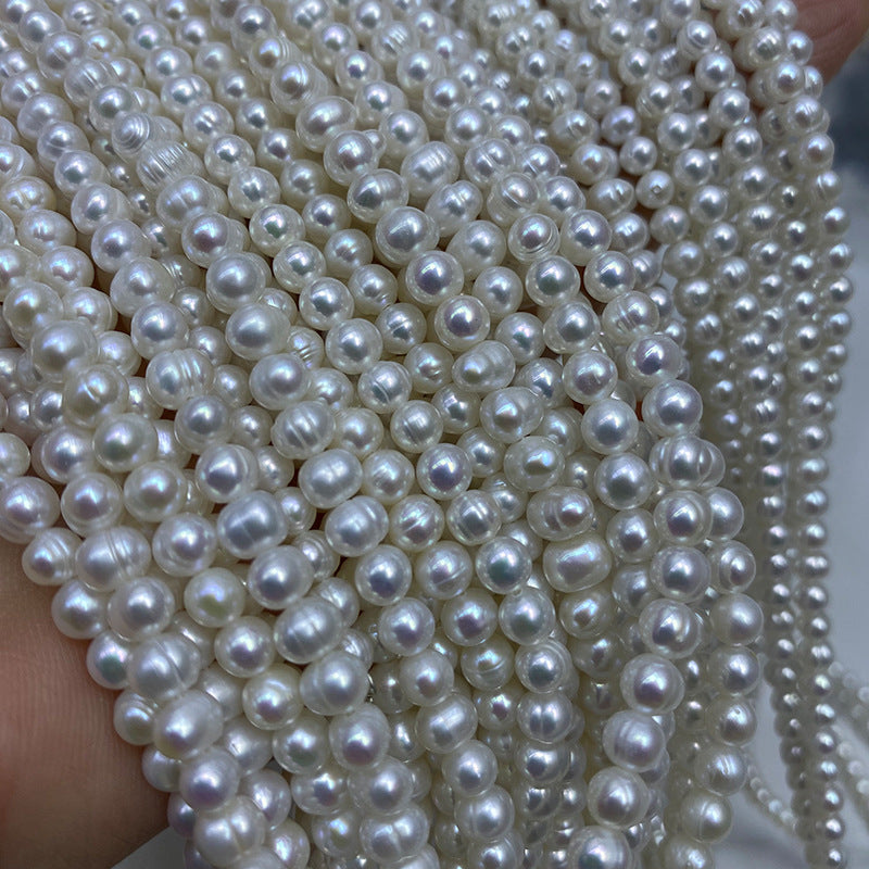 1173 Natural Freshwater Pearl 4-5-6 mm Threaded Near Round Pearl