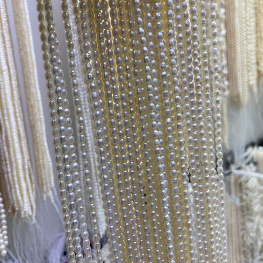 1056 Natural Freshwater Pearl 3-4mm Purple Rice Beads