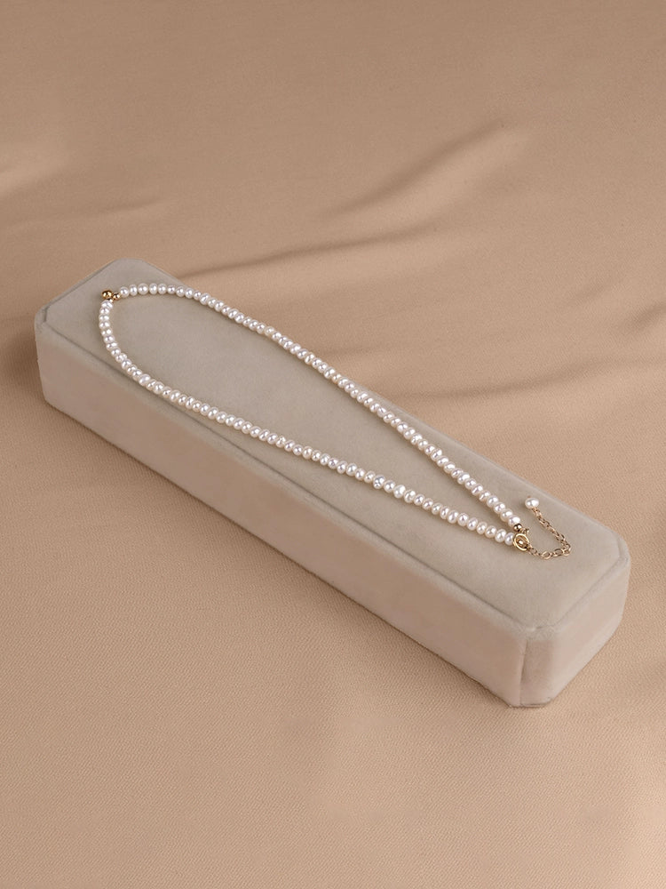 Natural freshwater pearl necklace niche bag gold nearly round strong light baby bead collarbone chain XL065