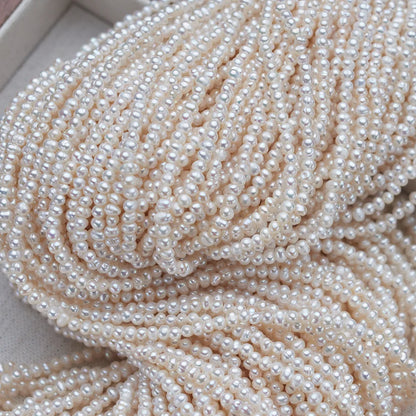 High quality 2-3mm small size rice seed natural freshwater white pearl chain loose bead string wholesale high loose beads