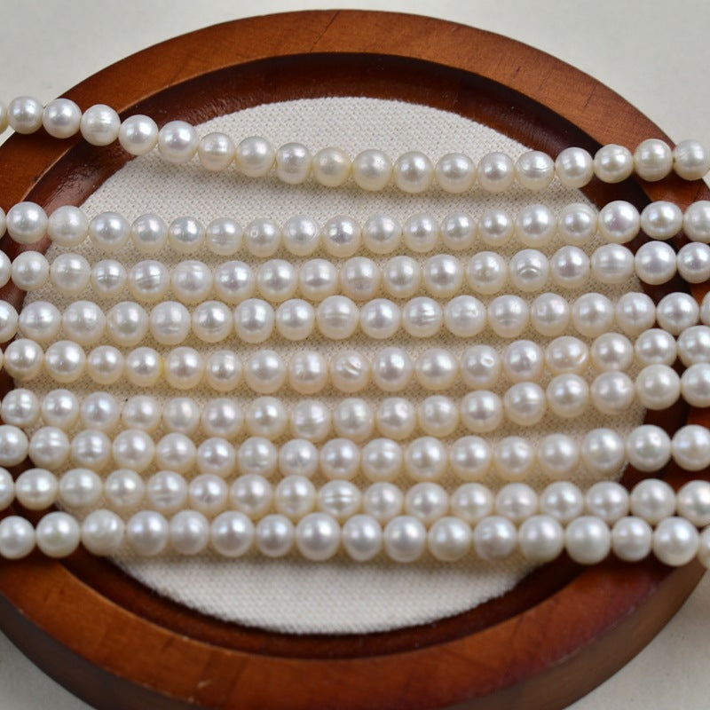 1200 Zhuji pearl 5-6mm white near-round pearl string