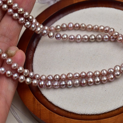 1110  4-5Mm purple nearly round pearl