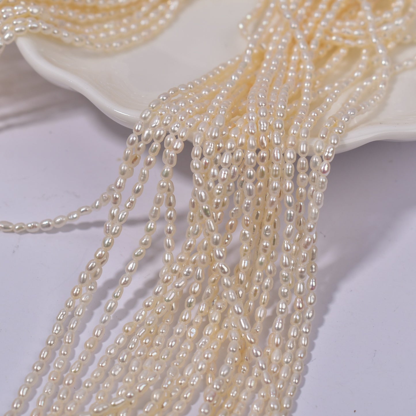 1004 Real pearls extremely fine 2-2.5 mm natural freshwater millet beads strong light work in progress naked beads string necklace pearl wholesale