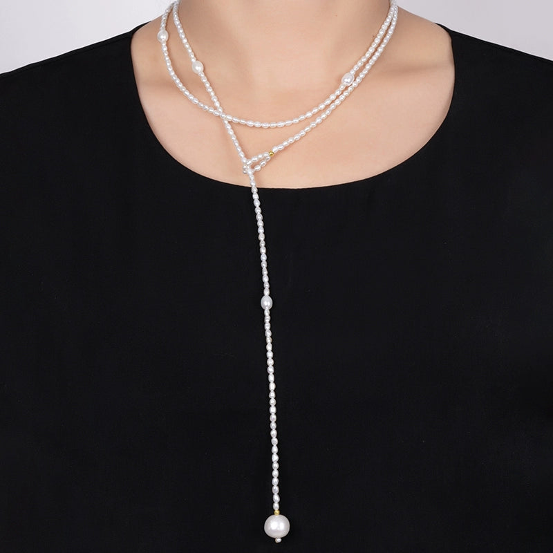 Natural freshwater pearl necklace, rice-shaped bead sweater chain, long temperament ins women's niche light luxury XL022