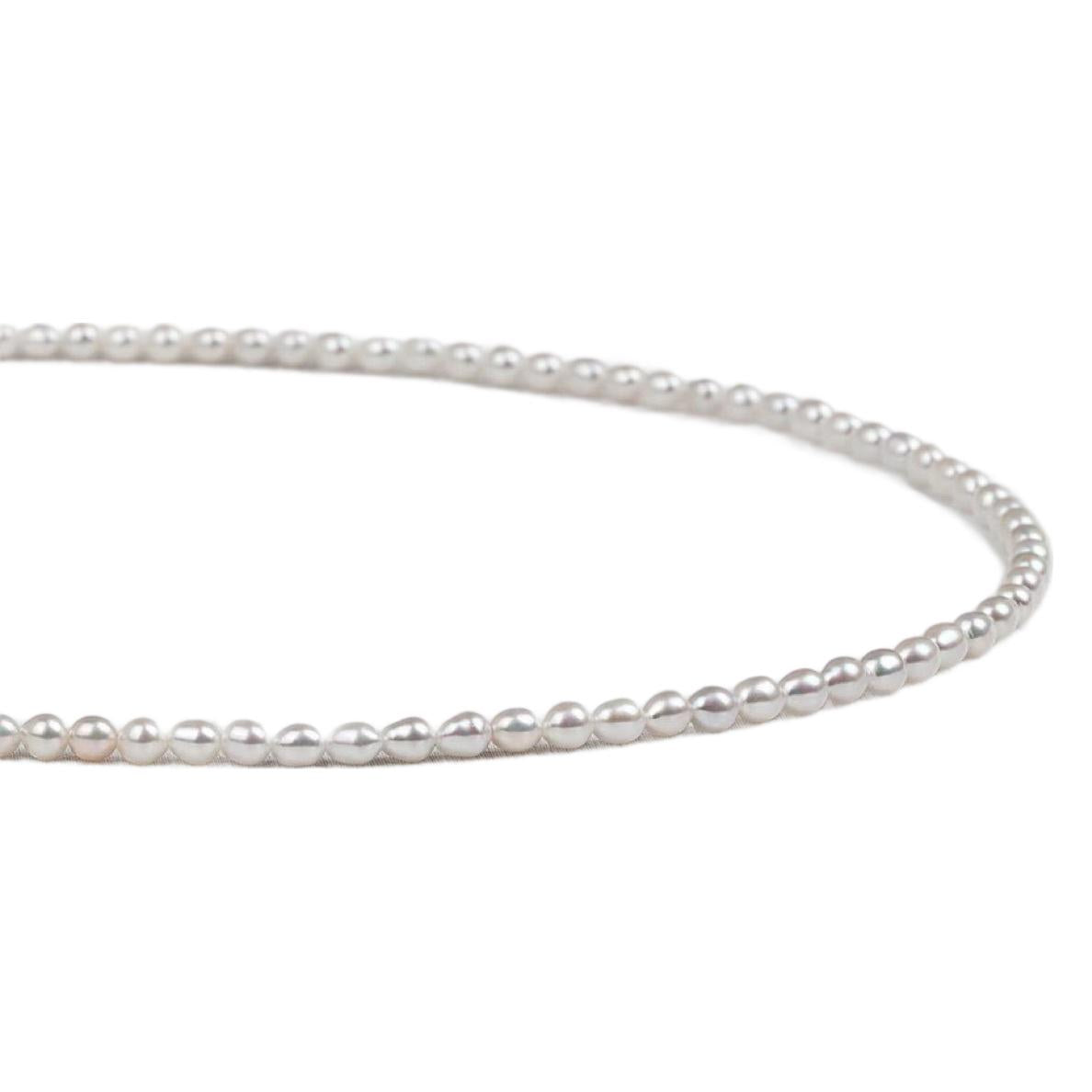 Natural freshwater strong light nearly round rice beads double-layer pearl necklace multi-stacked wear autumn and winter long sweater chain