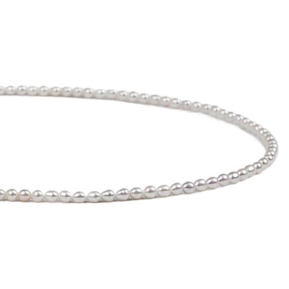 Natural freshwater strong light nearly round rice beads double-layer pearl necklace multi-stacked wear autumn and winter long sweater chain