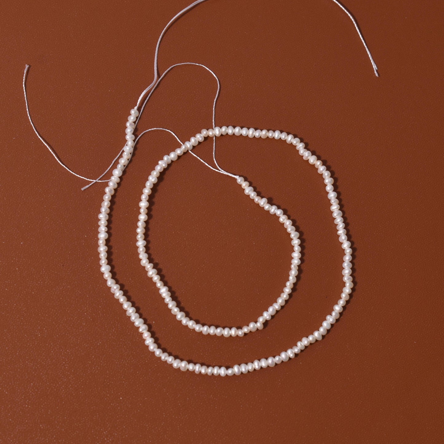 1119 strong light 2-3mm round natural freshwater pearl necklace work in progress DIY material