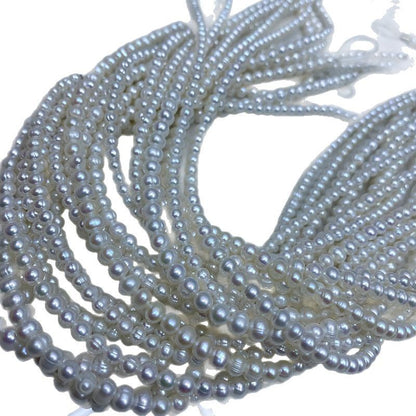 1173 Natural Freshwater Pearl 4-5-6 mm Threaded Near Round Pearl