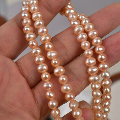 1178 5-6Mm nearly round pink purple pearl work in progress