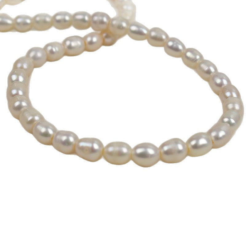1053 Natural freshwater pearl macroporous rice beads 7-8mm white