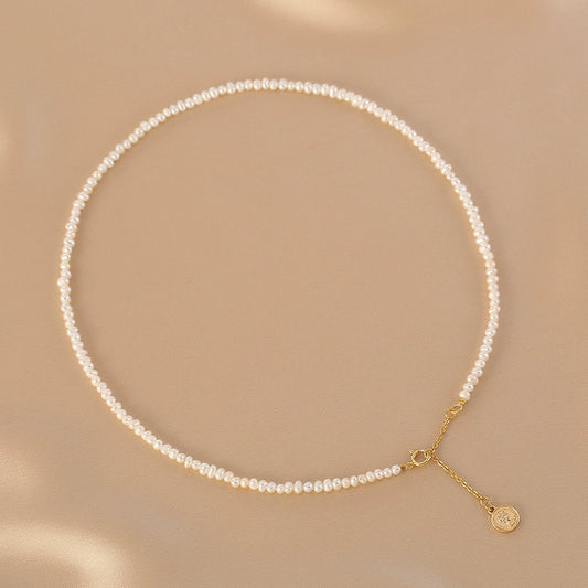 Natural pearl necklace, simple and exquisite irregular millet beads, tag necklace.