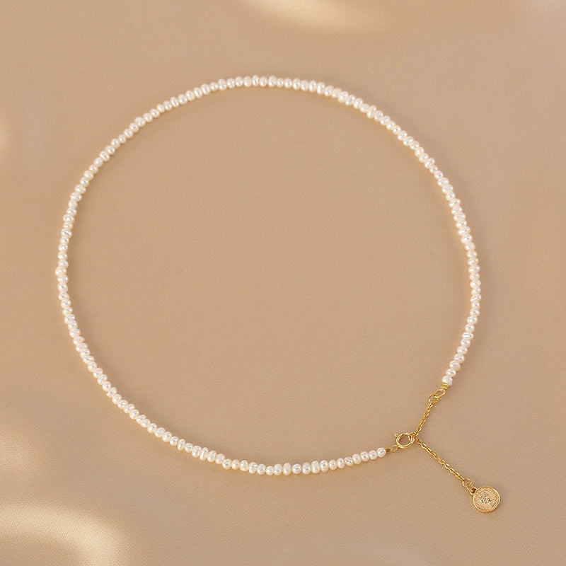 Natural pearl necklace, simple and exquisite irregular millet beads, tag necklace.