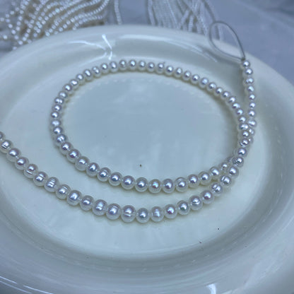 1173 Natural Freshwater Pearl 4-5-6 mm Threaded Near Round Pearl