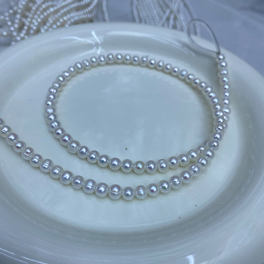 1173 Natural Freshwater Pearl 4-5-6 mm Threaded Near Round Pearl