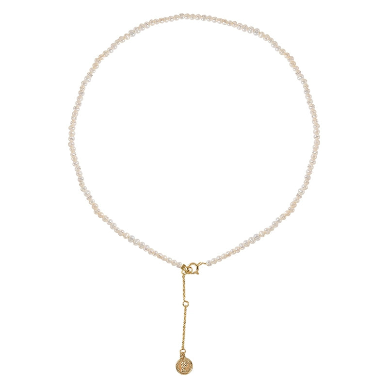 Natural pearl necklace, simple and exquisite irregular millet beads, tag necklace.
