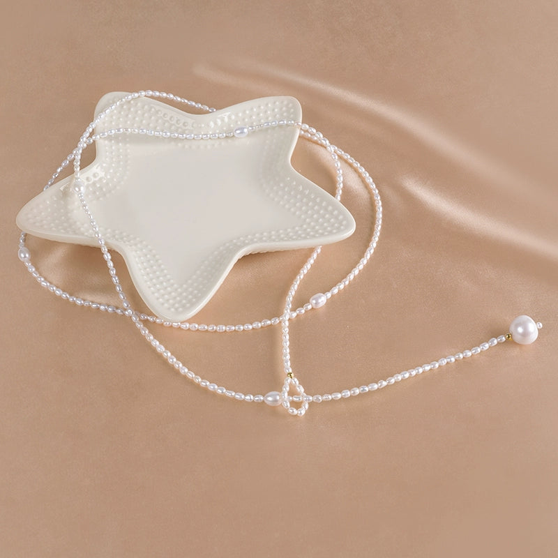 Natural freshwater pearl necklace, rice-shaped bead sweater chain, long temperament ins women's niche light luxury XL022