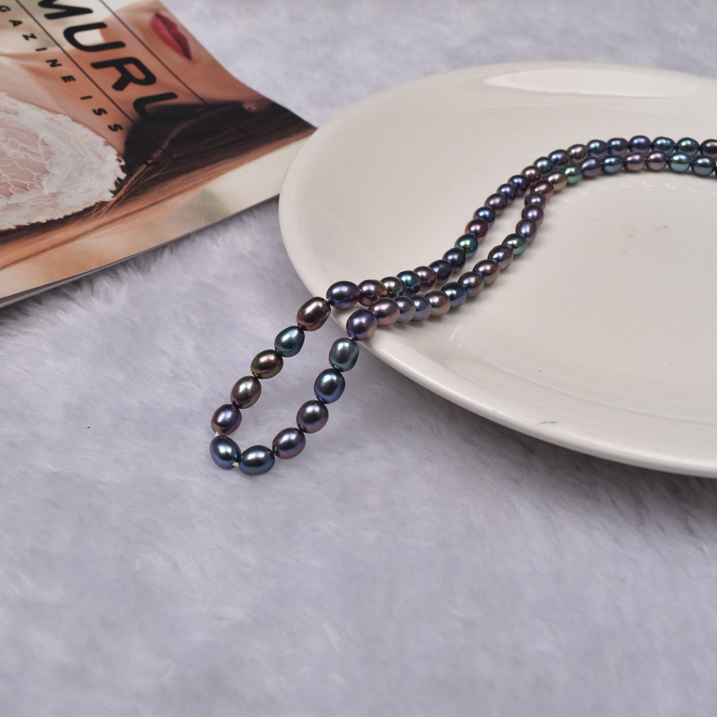 1043 4-5mm Natural Seedless Freshwater Pearl Black Millet-shaped Loose Bead