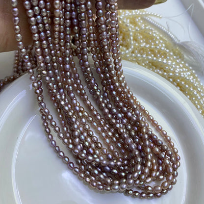 1056 Natural Freshwater Pearl 3-4mm Purple Rice Beads