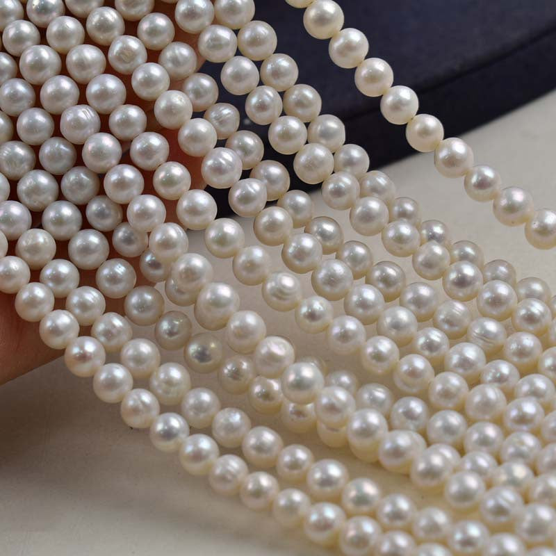 1200 Zhuji pearl 5-6mm white near-round pearl string