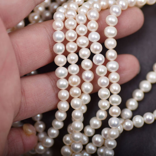1132 new 5-5.5 mm strong light nearly round natural freshwater pearl DIY material