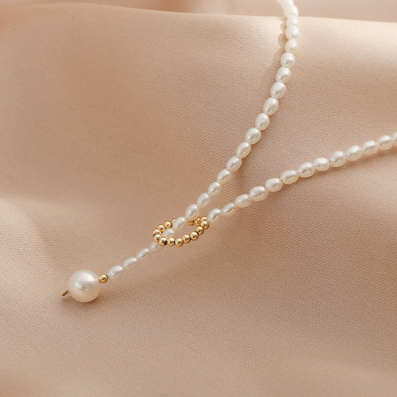 Freshwater pearl neck chain women's 14k gold bag retro simple style Internet celebrity short millet beads fairy super fairy collarbone chain