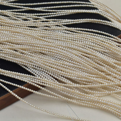 1133 natural freshwater pearls 2-3mm near round beads small flat beads loose beads DIY work in progress a string length about 38cm