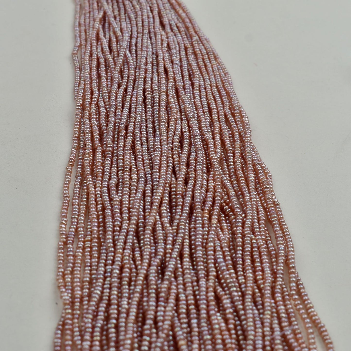 1234 natural freshwater pearls about 3mm purple pearls