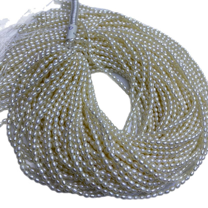 1056 Natural Freshwater Pearl 3-4mm Purple Rice Beads