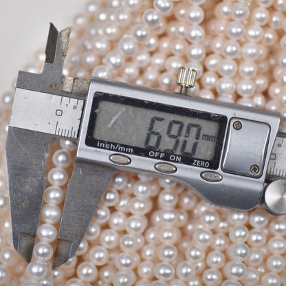 1121 Freshwater nearly round pearl beads about 6mm loose beads DIY beads wholesale