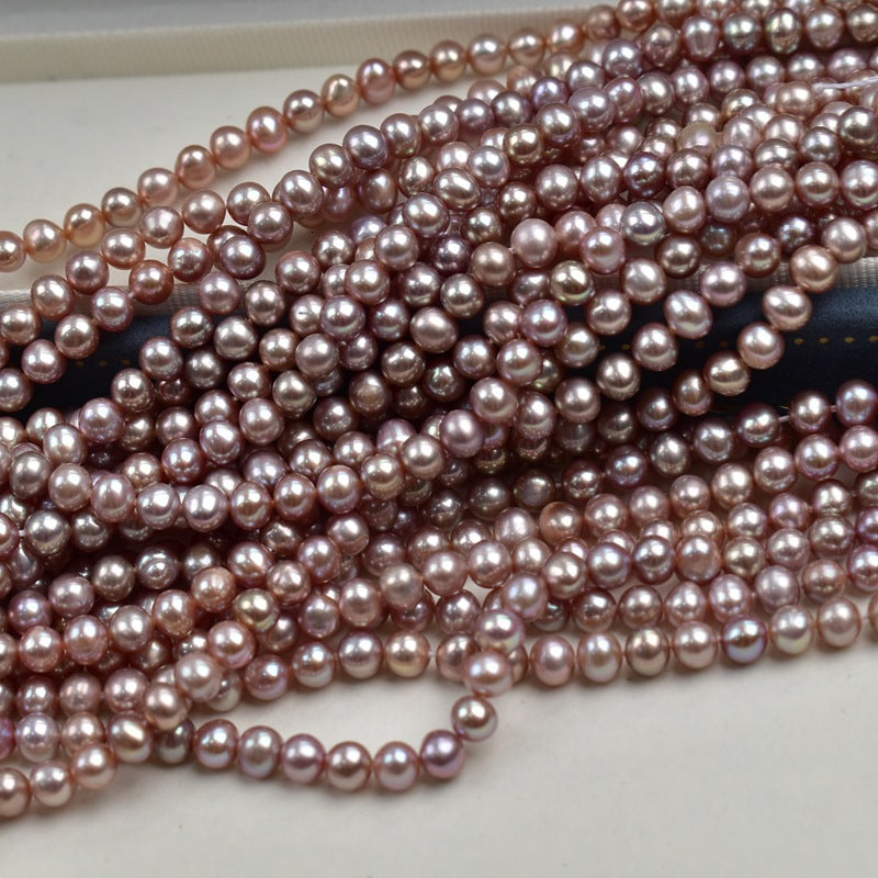 1110  4-5Mm purple nearly round pearl