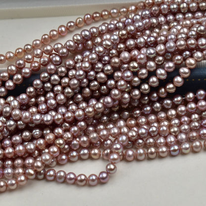 1110  4-5Mm purple nearly round pearl