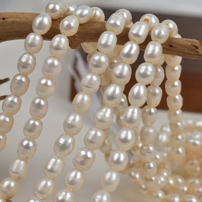 1053 Natural freshwater pearl macroporous rice beads 7-8mm white