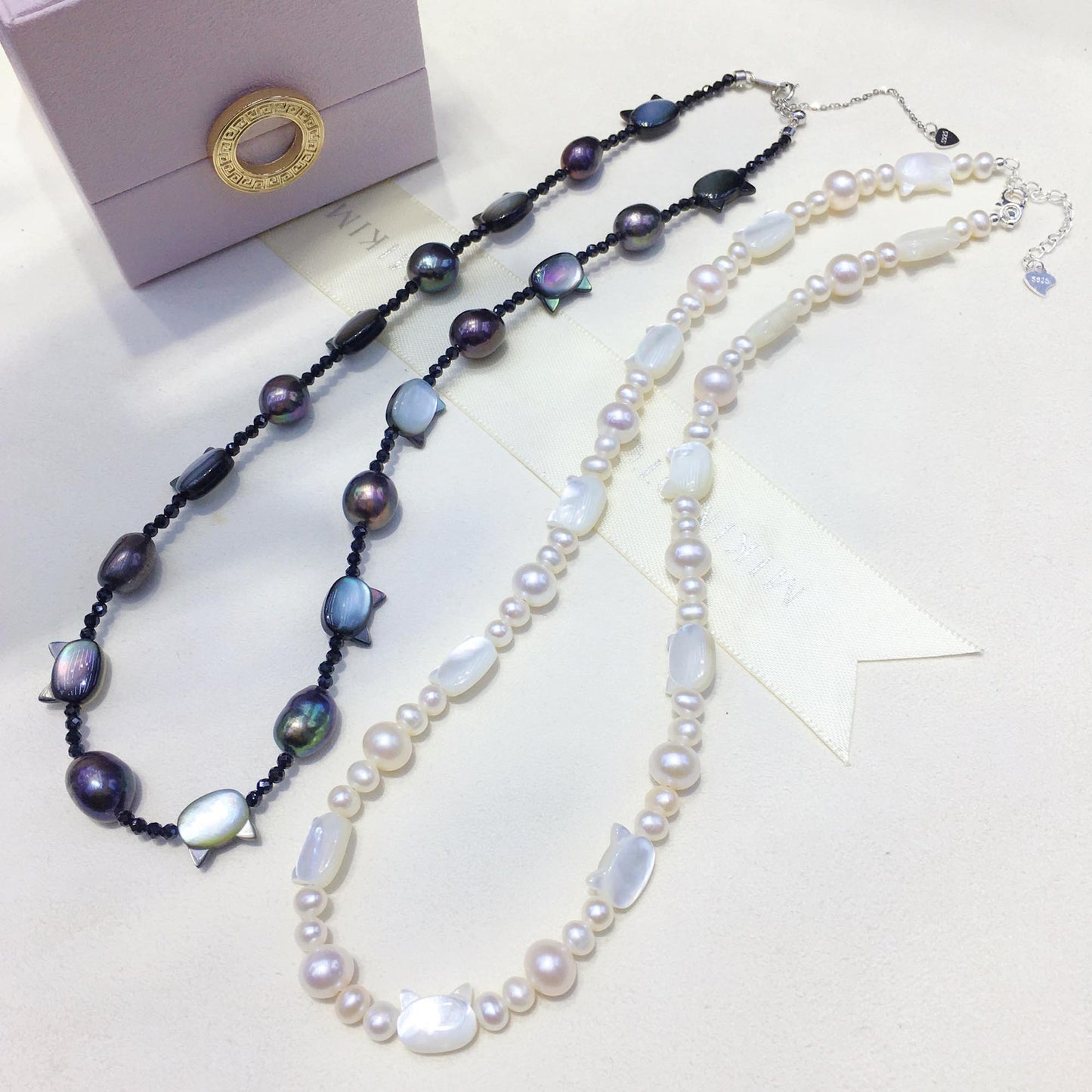 Idol Internet celebrity explosion tian ran freshwater real pearl shell black and white cat sweet cool wind necklace