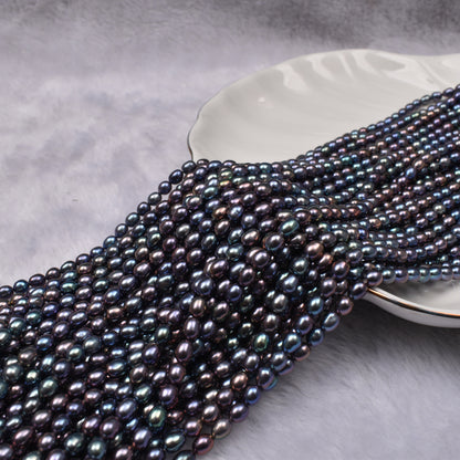 1043 4-5mm Natural Seedless Freshwater Pearl Black Millet-shaped Loose Bead