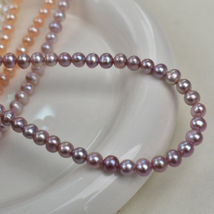 1178 5-6Mm nearly round pink purple pearl work in progress