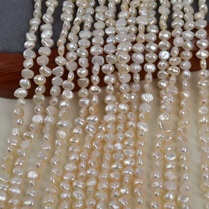 1319 40cm long, Baroque double-sided light pearl Irregular 5-6mm Natural freshwater pearl Raw materials working in progress