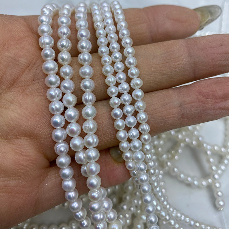 1173 Natural Freshwater Pearl 4-5-6 mm Threaded Near Round Pearl