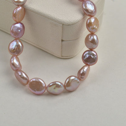 1071 11-12Mm Intense Purple Baroque Button Pearl