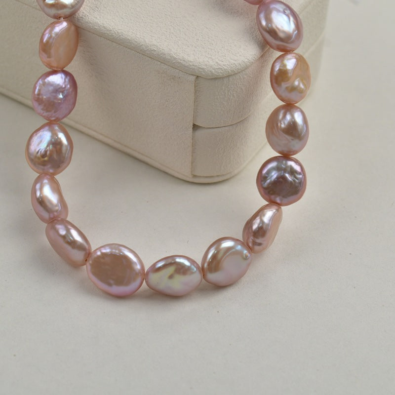 1071 11-12Mm Intense Purple Baroque Button Pearl