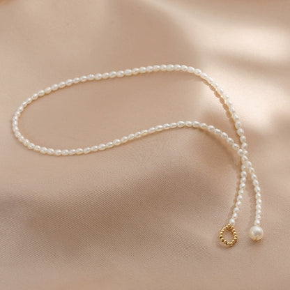Freshwater pearl neck chain women's 14k gold bag retro simple style Internet celebrity short millet beads fairy super fairy collarbone chain